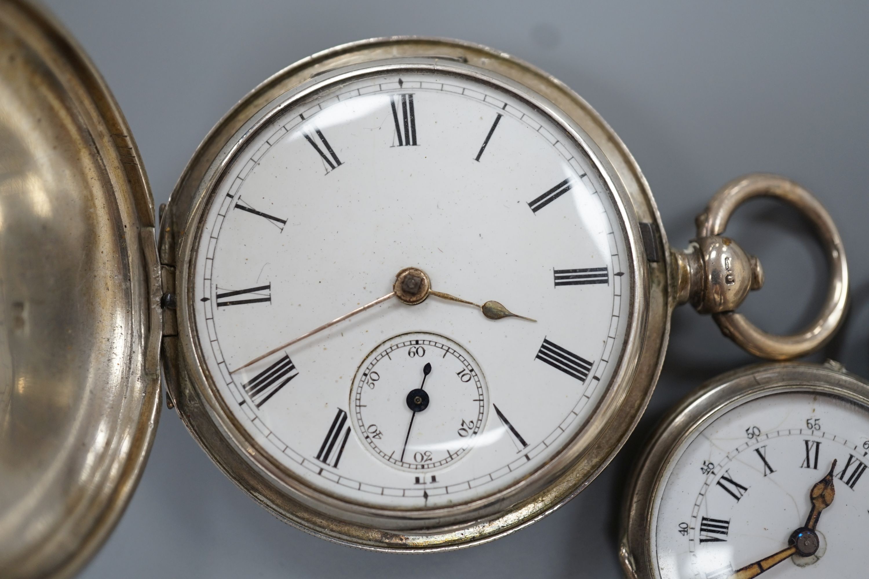 A Victorian silver keywind hunter pocket watch, case diameter 48mm and a white metal open face fob watch.